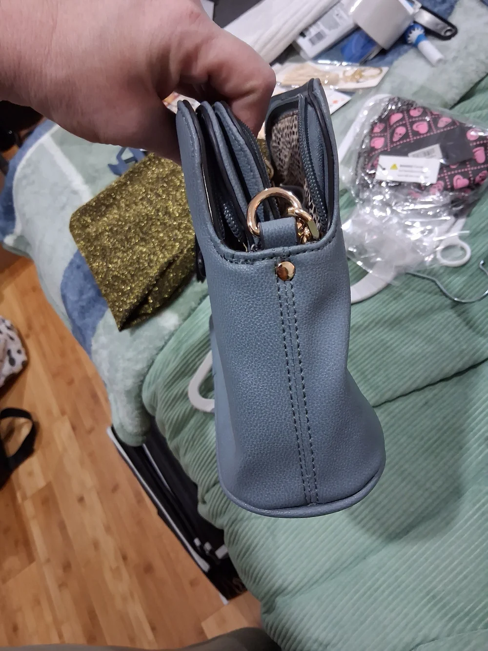 Small Pebbled Light Gray Crossbody Bag with Gold Accent